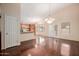 Bright dining room features hardwood floors and ample natural light from french doors at 1139 E Stephens Dr, Tempe, AZ 85283