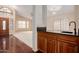 Bright living room with vaulted ceilings, a ceiling fan, and many large windows at 1139 E Stephens Dr, Tempe, AZ 85283