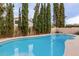 Beautiful pool surrounded by lush greenery at 1139 E Stephens Dr, Tempe, AZ 85283