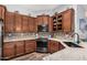 Well-equipped kitchen with granite countertops and ample cabinet space at 1144 W Tremaine Ave, Gilbert, AZ 85233