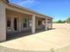 The backyard features a covered patio and gravel landscaping at 1210 E Westchester Dr, Chandler, AZ 85249