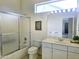 Clean bathroom featuring a shower-tub combo, vanity with sink, and bright lighting at 1210 E Westchester Dr, Chandler, AZ 85249