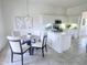 Cozy kitchen area with bright lighting, seating around table with white cabinets and modern appliances at 1210 E Westchester Dr, Chandler, AZ 85249