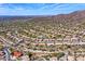 Breathtaking aerial view showcasing the community with scenic desert landscape and mountain views at 12225 E Cortez Dr, Scottsdale, AZ 85259
