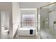 Modern bathroom featuring soaking tub, walk in shower, and separate toilet at 12225 E Cortez Dr, Scottsdale, AZ 85259