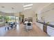 Spacious open concept kitchen with a large island, high-end appliances, and hardwood floors at 12225 E Cortez Dr, Scottsdale, AZ 85259
