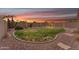 Expansive backyard showcasing a fire pit, patio area, and privacy fencing at 14010 N 126Th Ave, El Mirage, AZ 85335