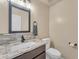 Stylish bathroom featuring granite countertop, modern fixtures, and decorative tile backsplash at 14010 N 126Th Ave, El Mirage, AZ 85335