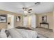 Spacious bedroom with adjoining rooms, carpet, neutral colors and abundant closet space at 14010 N 126Th Ave, El Mirage, AZ 85335