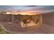 Inviting fire pit area with comfortable seating, perfect for evening gatherings at 14010 N 126Th Ave, El Mirage, AZ 85335