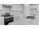 Modern kitchen includes stainless appliances, solid countertops, and white cabinets at 1409 E Jacqueline Pl, Casa Grande, AZ 85122
