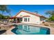 Pool, spa and built-in grill area create an inviting outdoor living space for entertainment and relaxation at 14248 N 56Th Pl, Scottsdale, AZ 85254