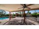 Relaxing backyard featuring a covered patio, pool, spa and fire pit for outdoor enjoyment at 14248 N 56Th Pl, Scottsdale, AZ 85254