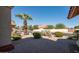 Desert landscaping and hardscape create an inviting front yard at 14248 N 56Th Pl, Scottsdale, AZ 85254