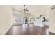 Bright living room features hardwood flooring, ceiling fan, and access to the backyard patio at 14248 N 56Th Pl, Scottsdale, AZ 85254