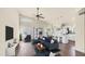 Open concept living area showcases a vaulted ceiling, fan, and seamless flow to the dining and kitchen spaces at 14248 N 56Th Pl, Scottsdale, AZ 85254
