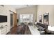 Main bedroom boasts a vaulted ceiling, fan, bay window seating, and ensuite access with a sliding barn door at 14248 N 56Th Pl, Scottsdale, AZ 85254