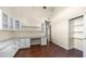 The office features hardwood floors, vaulted ceiling, and built-in cabinetry at 14248 N 56Th Pl, Scottsdale, AZ 85254