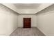 Walk-in closet with custom shelving and dresser at 15010 W Hope Dr, Surprise, AZ 85379