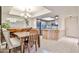 Open-concept dining area connected to the kitchen, perfect for entertaining at 17404 N 99Th Ave # 318, Sun City, AZ 85373