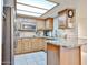 Well-maintained kitchen with stainless steel appliances and plenty of cabinet space at 17404 N 99Th Ave # 318, Sun City, AZ 85373