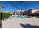Community pool with plenty of seating for residents at 17404 N 99Th Ave # 318, Sun City, AZ 85373