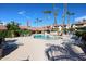 Community pool area provides residents with plenty of lounging space at 17404 N 99Th Ave # 318, Sun City, AZ 85373