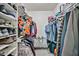 Organized walk-in closet with shelving, hanging rods, and ample storage space at 17404 N 99Th Ave # 318, Sun City, AZ 85373