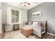 Comfortable bedroom with a day bed, soft rug, and plenty of natural light at 17797 W Statler Dr, Surprise, AZ 85388