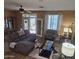 Inviting living room with plush seating, natural light, and stylish decor for comfortable living at 17797 W Statler Dr, Surprise, AZ 85388