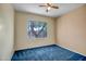 Bedroom featuring a window overlooking the front yard at 20007 N Organ Pipe Dr, Surprise, AZ 85374