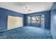 Spacious bedroom featuring a bay window overlooking the front yard at 20007 N Organ Pipe Dr, Surprise, AZ 85374