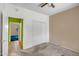 Bedroom with standard closet, ceiling fan, and carpet at 20007 N Organ Pipe Dr, Surprise, AZ 85374