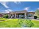Beautiful backyard with patio, spiral staircase to a second level deck, and mature landscaping at 2106 E Beth Dr, Phoenix, AZ 85042