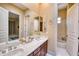Bathroom with a double sink vanity, granite countertops, and access to the shower at 2106 E Beth Dr, Phoenix, AZ 85042