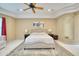 Bright and airy main bedroom featuring a tray ceiling and a neutral color palette at 2106 E Beth Dr, Phoenix, AZ 85042
