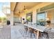 Covered patio with outdoor seating, ceiling fans, and spiral staircase to a second level deck at 2106 E Beth Dr, Phoenix, AZ 85042