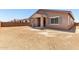 Expansive backyard featuring a covered patio, perfect for outdoor entertaining and enjoying the peaceful surroundings at 21838 E Bonanza Ct, Queen Creek, AZ 85142