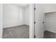 Bedroom with carpet, white walls, and a closet at 21838 E Bonanza Ct, Queen Creek, AZ 85142