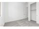 Bright bedroom with soft carpeting, closet, and window offers a blank canvas to customize and enjoy at 21838 E Bonanza Ct, Queen Creek, AZ 85142