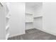 Walk-in closet with carpet and shelving at 21838 E Bonanza Ct, Queen Creek, AZ 85142