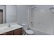 Bright bathroom features a shower-tub combo, toilet, and single sink vanity at 2318 W Kristina Ave, San Tan Valley, AZ 85144