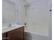 Bathroom featuring a vanity with a sink, a mirror, and a shower and tub combo at 2318 W Kristina Ave, San Tan Valley, AZ 85144