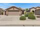 Charming single-story home featuring a two-car garage and desert landscaping in a well-maintained community at 2318 W Kristina Ave, San Tan Valley, AZ 85144