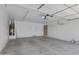 Spacious two car garage with water heater, service door, and plenty of room for cars at 2318 W Kristina Ave, San Tan Valley, AZ 85144