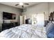 Large bedroom featuring high ceilings, neutral color palette and en suite bathroom at 238 W Marco Polo Rd, Phoenix, AZ 85027