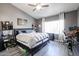 Comfortable bedroom with natural light from the window and neutral color scheme at 238 W Marco Polo Rd, Phoenix, AZ 85027