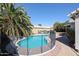 Backyard showcasing a sparkling swimming pool with a safety fence at 238 W Marco Polo Rd, Phoenix, AZ 85027