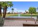 Beautiful backyard oasis with palm trees and golf course views at 2461 Leisure World --, Mesa, AZ 85206