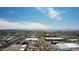 Expansive aerial view of the property showcasing its location within the vibrant cityscape and the breathtaking mountain views at 2542 W Missouri Ave, Phoenix, AZ 85017